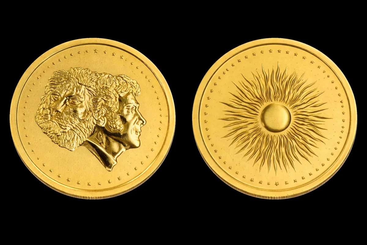 Prototipo de la moneda de oro de Javier Milei con perfil de león y frase Viva la libertad carajo, encontrado en celular de Novelli.
