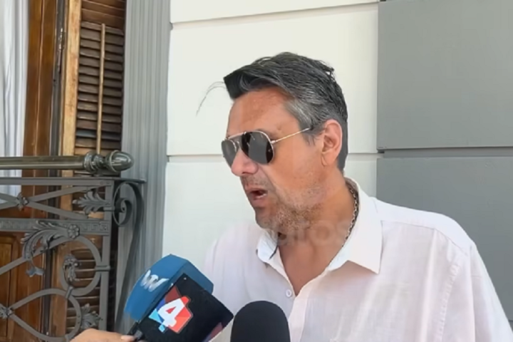 Empresario brindando declaraciones a la prensa tras el operativo policial durante el Halloween en Salto.