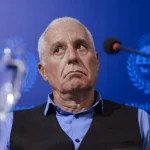 Ministro Carlos Negro junto a Yamandú Orsi en presentación de seguridad