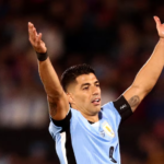 Luis Suárez cuatro estrellas en el escudo uruguayo