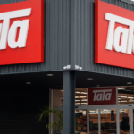 Logo de Ta-Ta y Grupo Vierci COMPRA TA-TA en oficina de negocios.