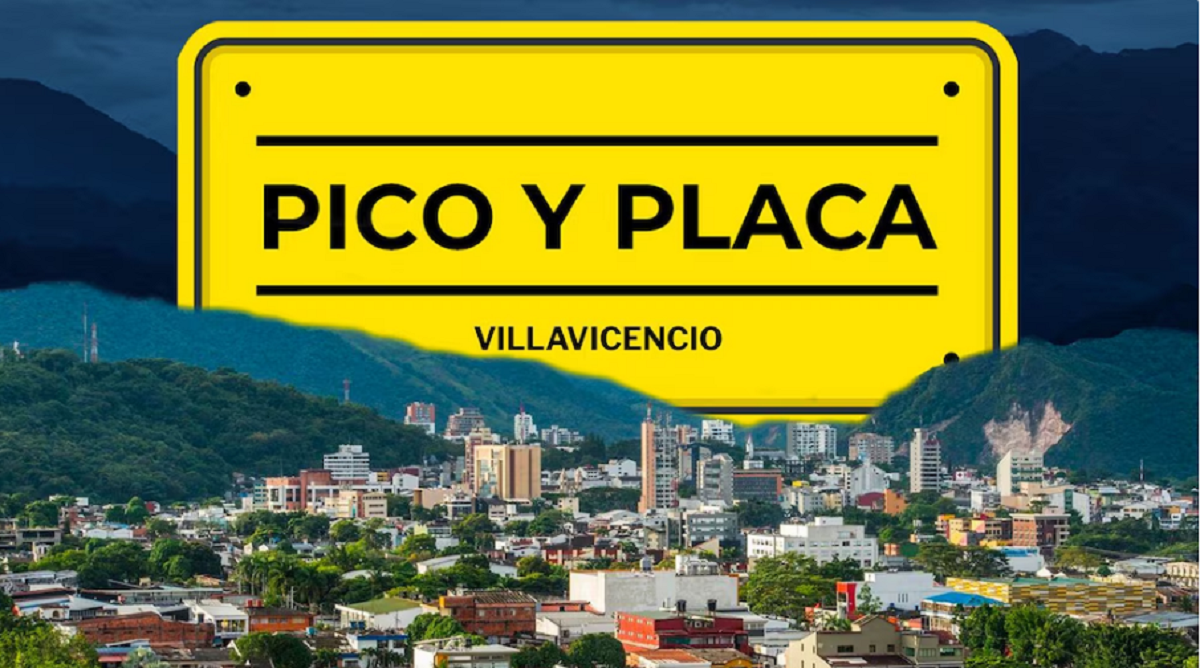 Agente de tránsito controlando la circulación de vehículos en Colombia