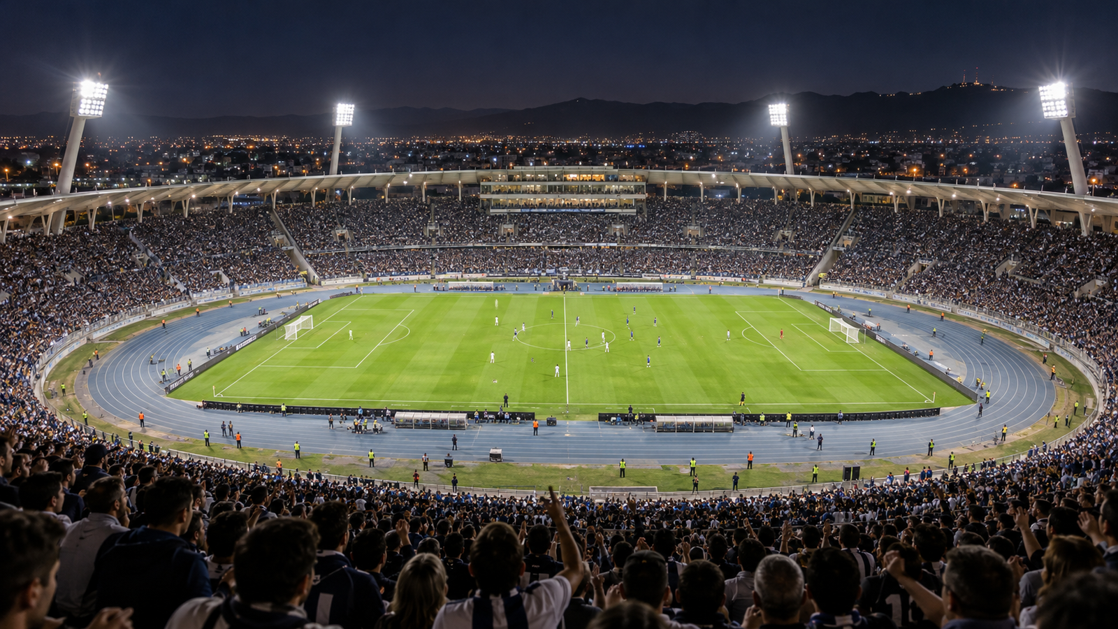 Vista panorámica del estadio Mario Alberto Kempes de Córdoba iluminado para un partido nocturno.
