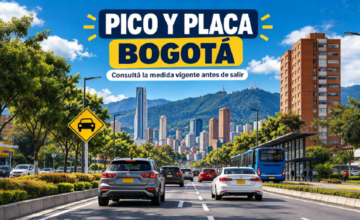 Flujo de vehículos transitando por una avenida principal de Bogotá durante la jornada.