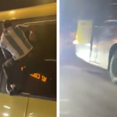 Unidad de ómnibus de la empresa UCOT detenida en una avenida de Montevideo.